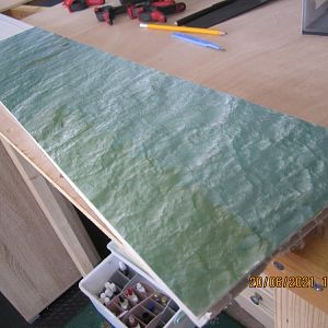 Laminated sheets glued to PVC strip