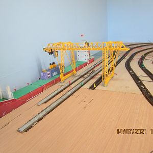 Crane placed in docks to get track spacings aligned